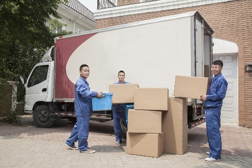 Furniture pick-up team collecting bulky items in a Brompton residential street