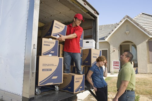 Local Brompton moving truck handling business equipment