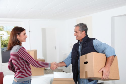 Loading furniture into a moving truck in Brompton street