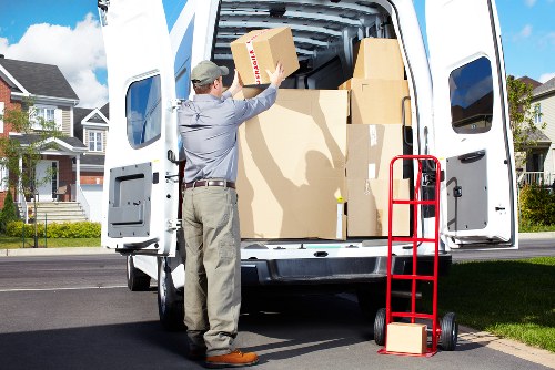 Loading furniture into a removal truck for Brompton customers