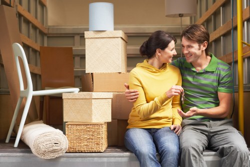 Local moving van handling furniture and boxes in Brompton streets